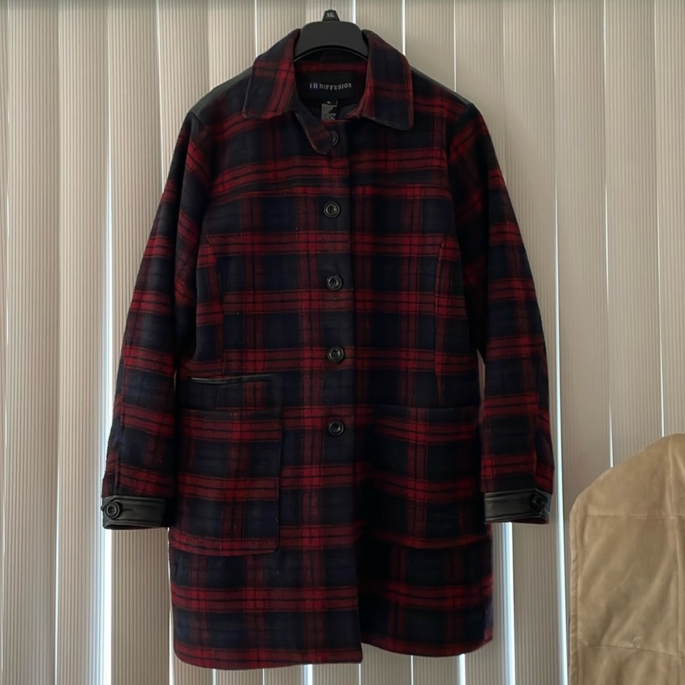 Light/medium weight winter coat. Navy &  red plaid with faux leather black trim.